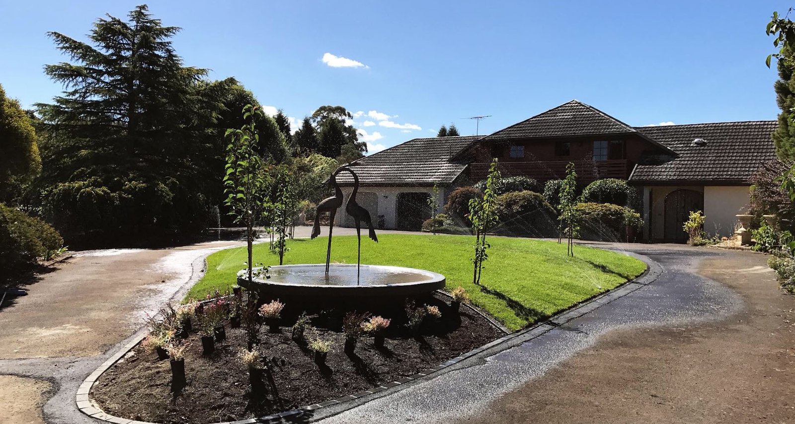 landscaped driveway/ house entry